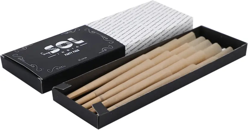 Box of SOL paint sticks with a white cloth on a white background