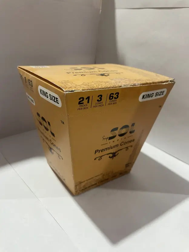 SOL Cardboard box with 'King Size' and product details on a white floor.