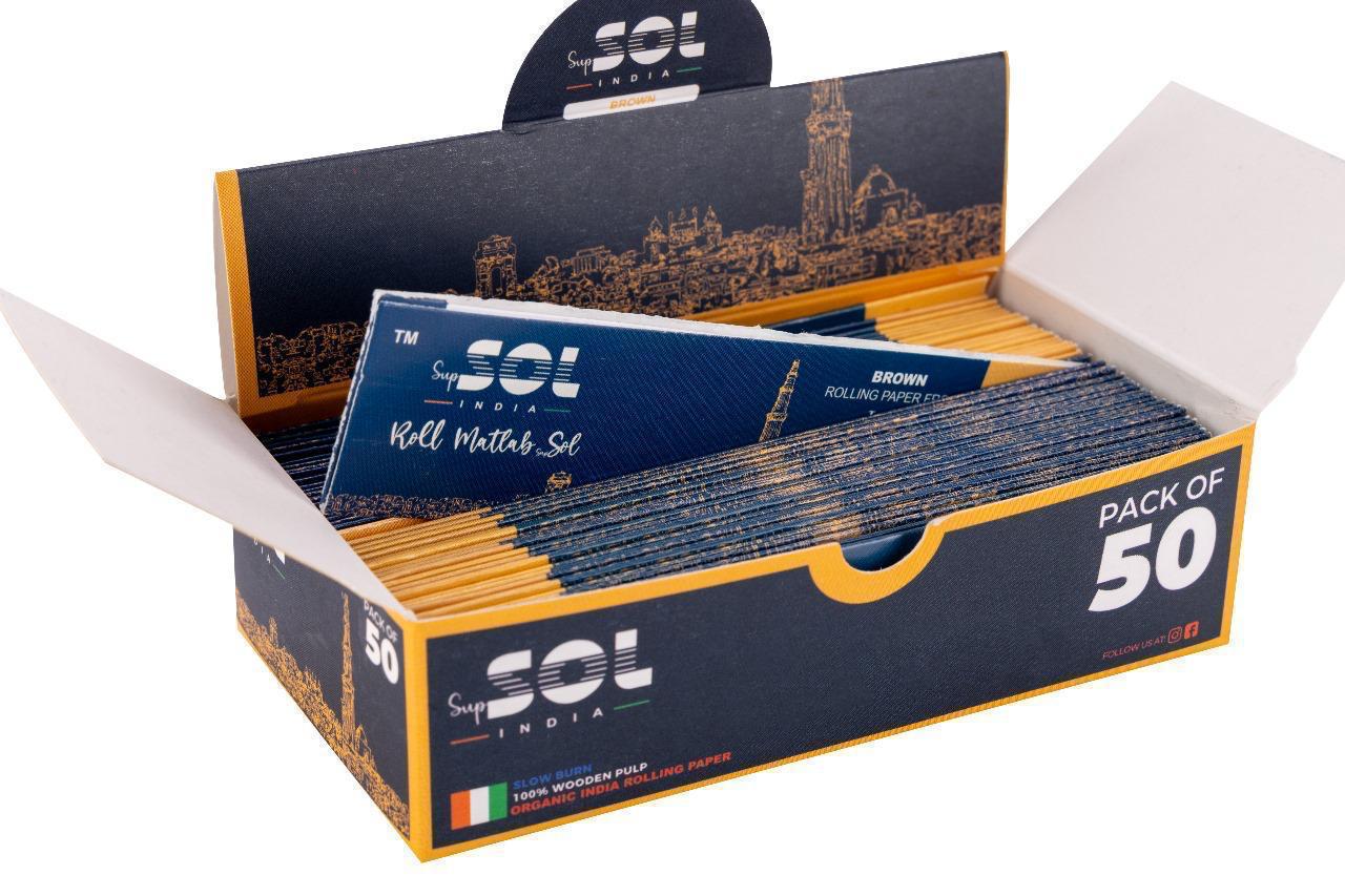 Box of SOl rolling papers with a city skyline design on the lid.